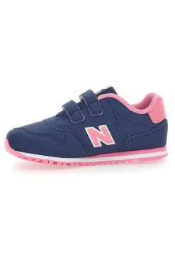Blaue Sneakers New Balance 500 mit rosa Details und Klettverschluss
