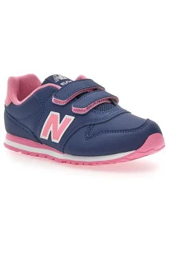 Blaue Sneakers New Balance 500 mit rosa Details und Klettverschluss