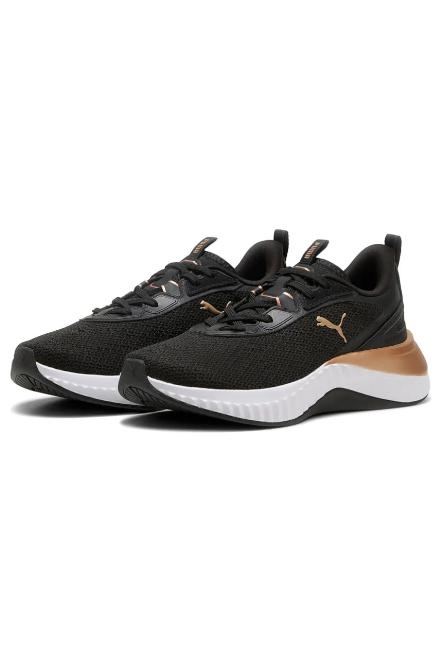 Scarpe da ginnastica nere con dettagli oro e suola Softride Puma Softride Sera Wns