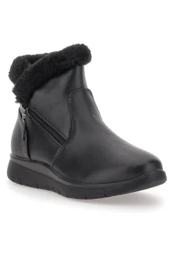 Schwarze Stiefeletten mit Reißverschluss im Café kosten 4195