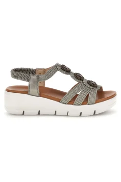 Silberne Sandalen mit dekorativen Applikationen und Keil The first active 24001B