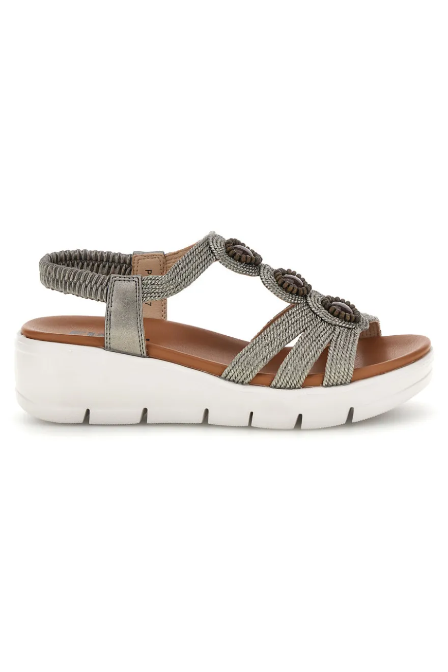 Silberne Sandalen mit dekorativen Applikationen und Keil The first active 24001B
