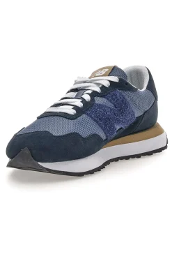 Sneaker blu inserti in pelle New balance M2374EK