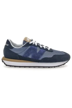 Sneaker blu inserti in pelle New balance M2374EK