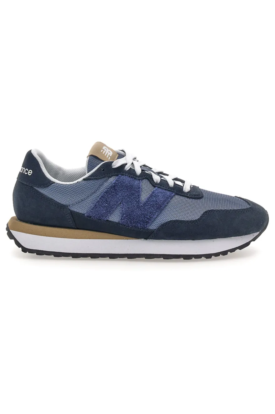Sneaker blu inserti in pelle New balance M2374EK