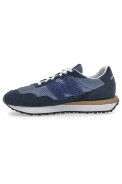 Sneaker blu inserti in pelle New balance M2374EK