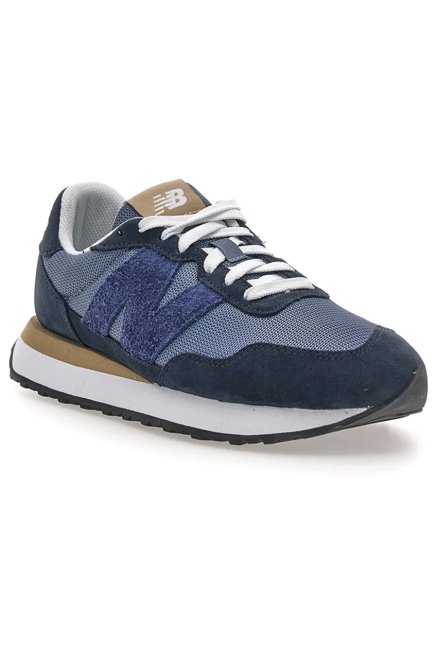Sneaker blu inserti in pelle New balance M2374EK