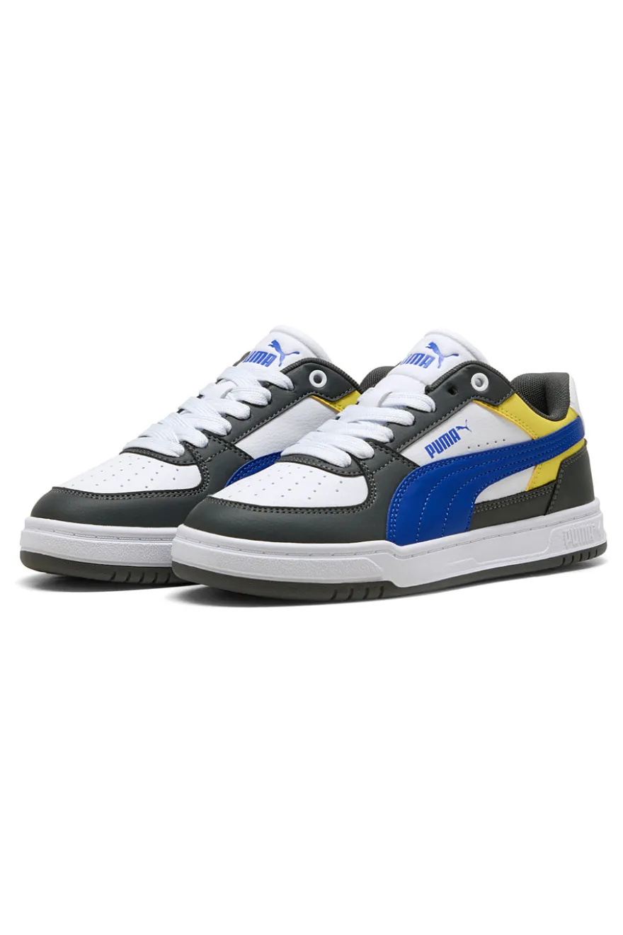 Sneakers bianche verdi blu e gialle stile court Puma Caven III Block Jr
